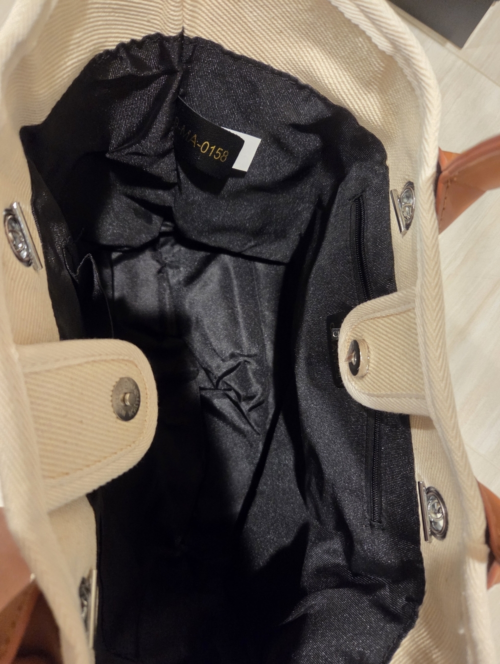 CHANEL Cream Canvas Tote with Pearl Logo and Tan Leather Handles - Picture 5 of 5